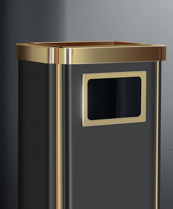 Viền inox mạ vàng sáng bóng nổi bật trên tông màu đen của thùng rác